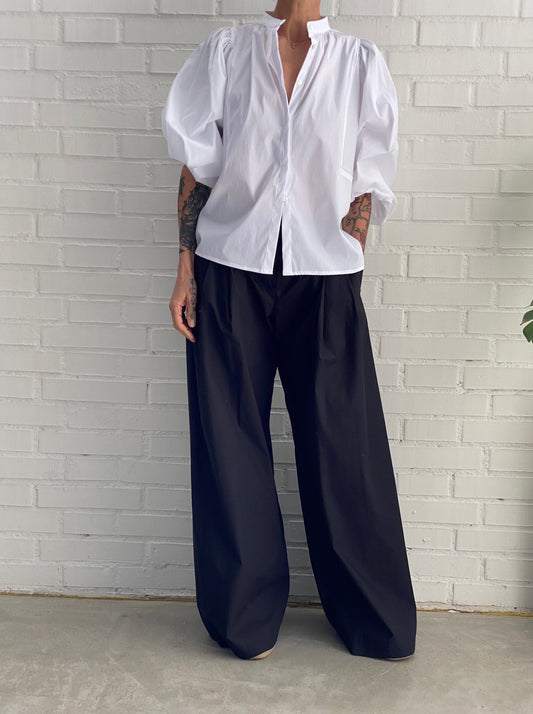 Wide pleated trousers