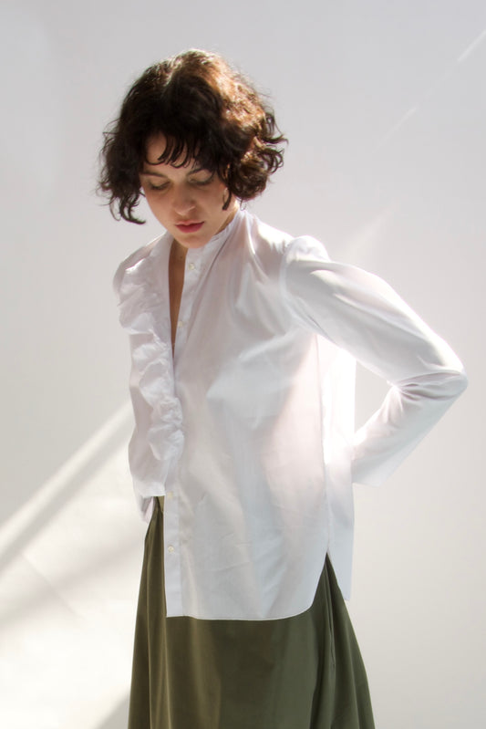 Shirt with raw edge placket