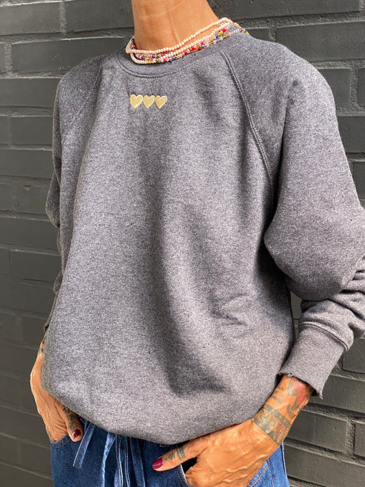 Felpa raglan con ricamo CUORI