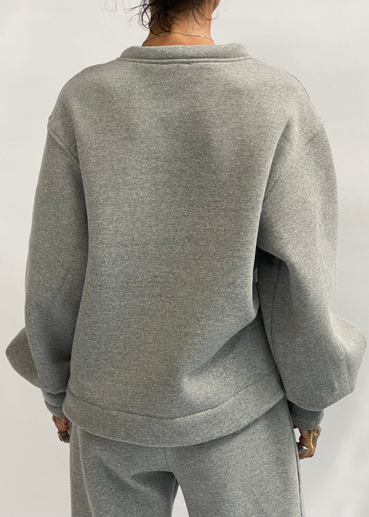 Felpa con pinces sul polso