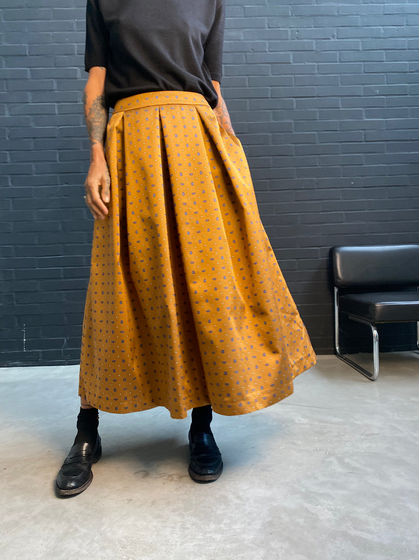 Gonna ampia a pieghe cravatta