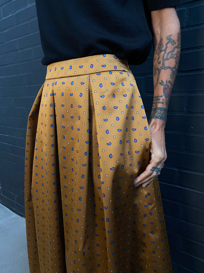 Gonna ampia a pieghe cravatta