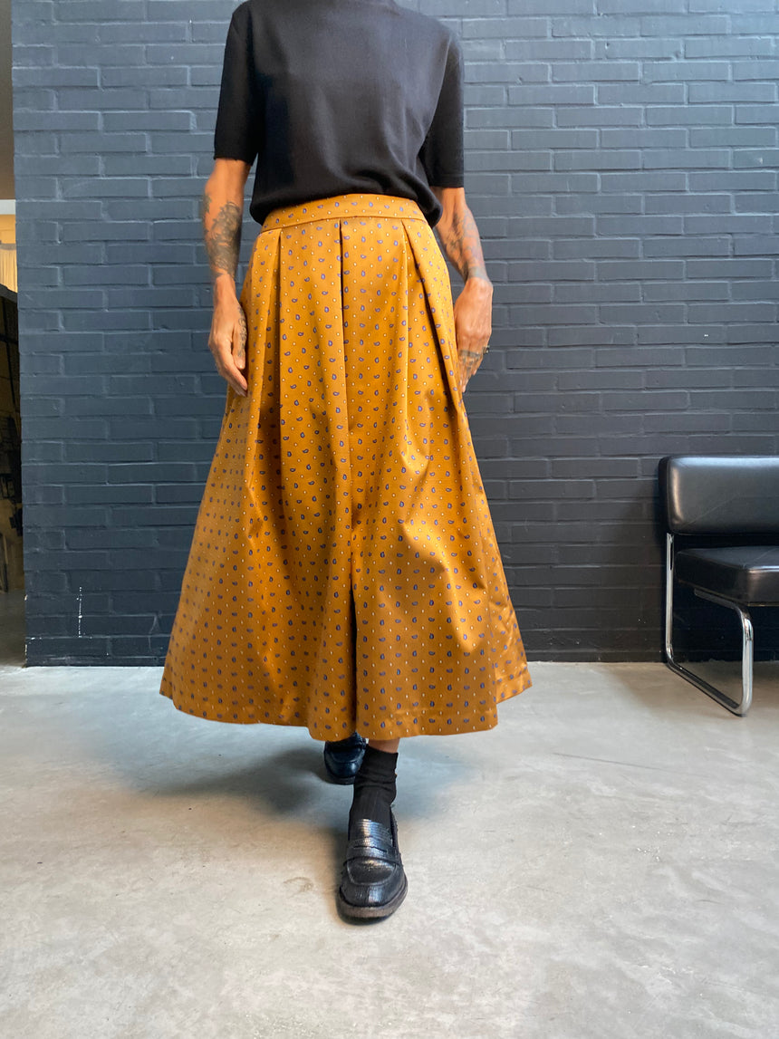 Gonna ampia a pieghe cravatta