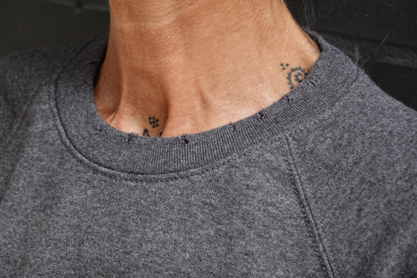 Felpa raglan con patch cuore