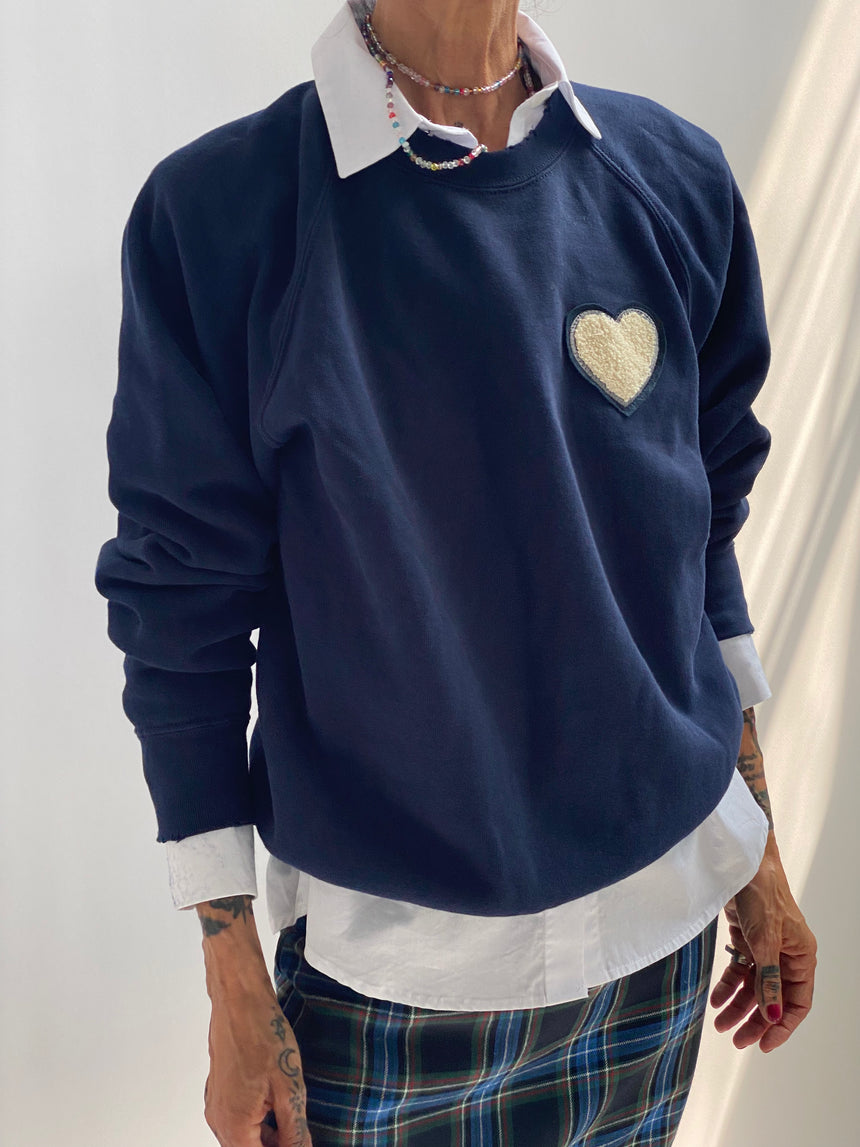 Felpa raglan con patch cuore
