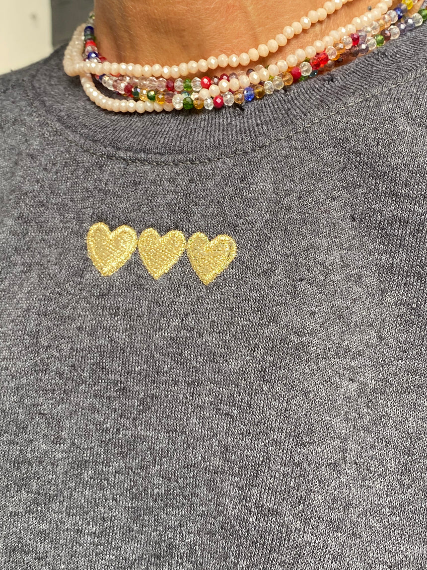 Felpa raglan con ricamo CUORI