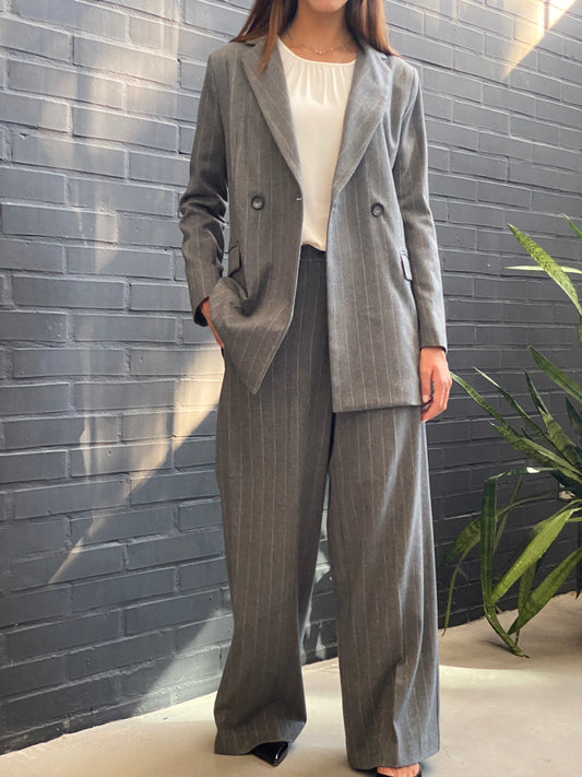 Wide pinstriped trousers